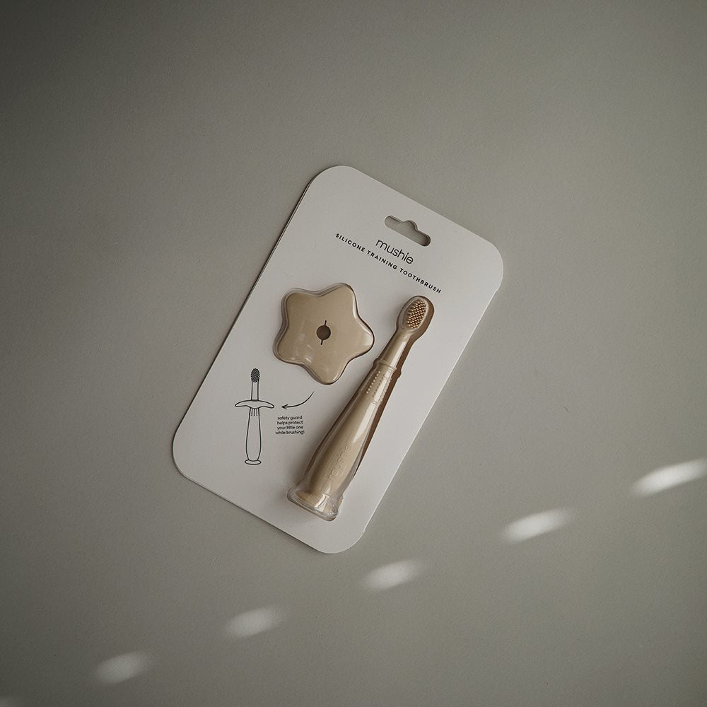 Mushie® Silikonska zobna ščetka Shifting Sand Mushie