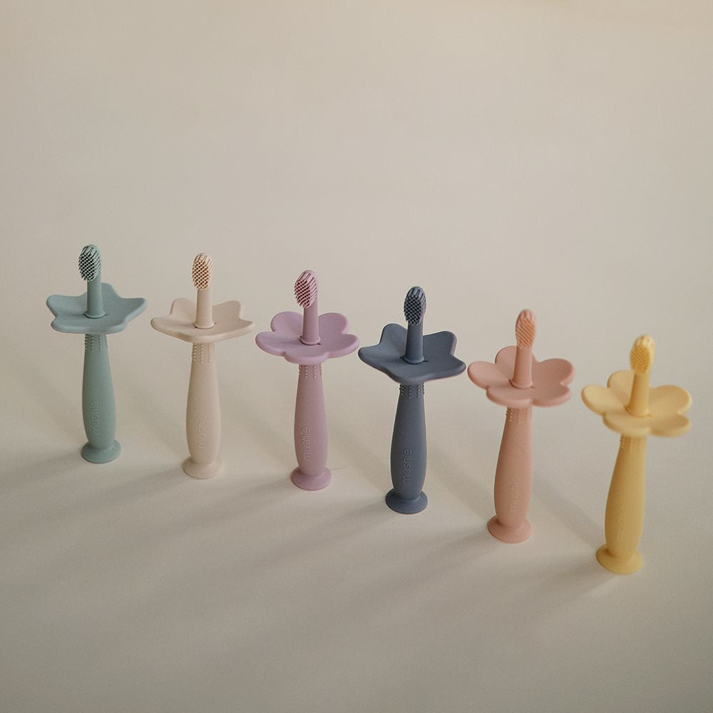 Mushie® Silikonska zobna ščetka Soft Lilac Mushie