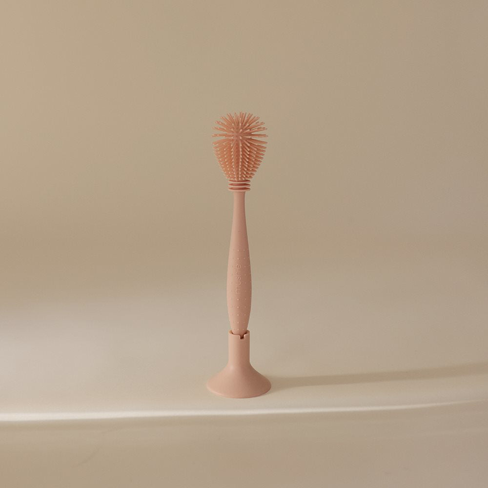 Mushie® Silikonska krtačka za čiščenje Blush Mushie