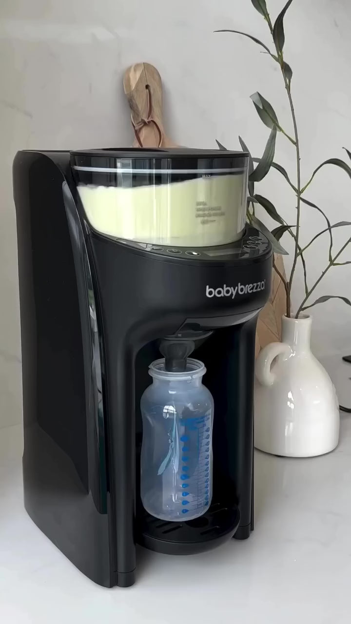 Carica video: Baby Brezza® Macchina prepara biberon Pro Advanced White