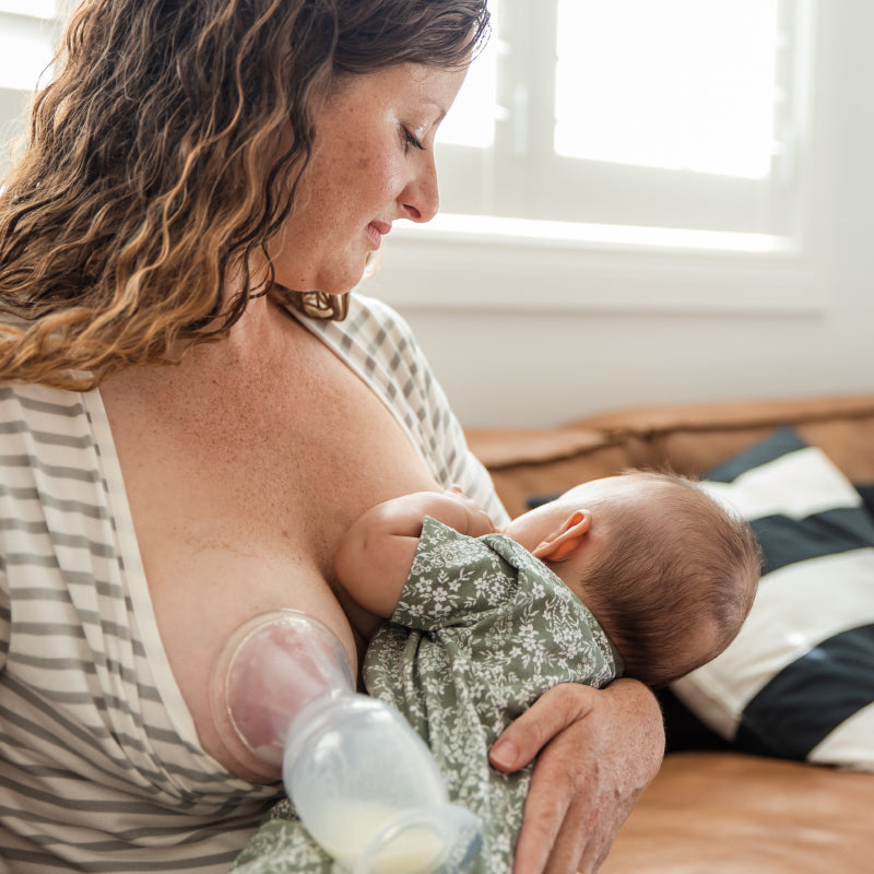 Haakaa® Silikonska črpalka 2.gen. 100ml in Pokrovček Rožica Haakaa