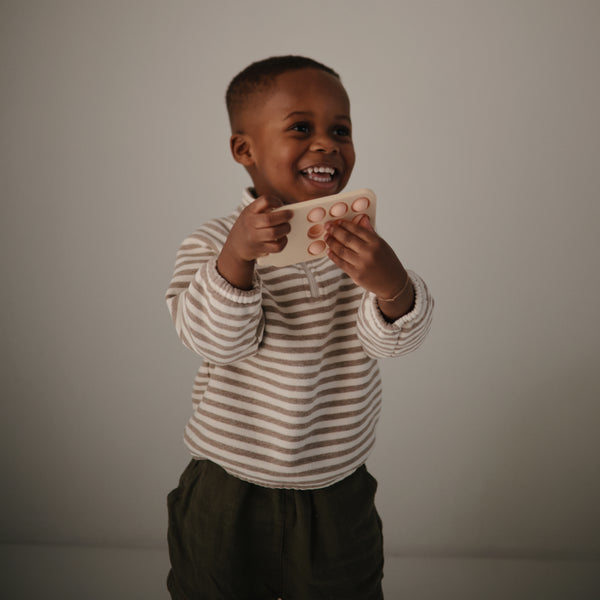 Mushie® Aktivnostna igračka iz silikona Telefon Blush Mushie