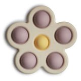 Mushie® Giocattolo per bambini POP-IT Flower Soft Lilac/Pale Daffodil/Ivory/Sand