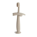 Mushie® Brosse à dents Star Training Sand