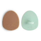 Mushie® Silikonska krtača za odstranjevanje lusk 2 kosa Natural/Cambridge Blue