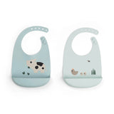 Done by Deer® Set od 2 silikonske slinčice Tiny farm Blue