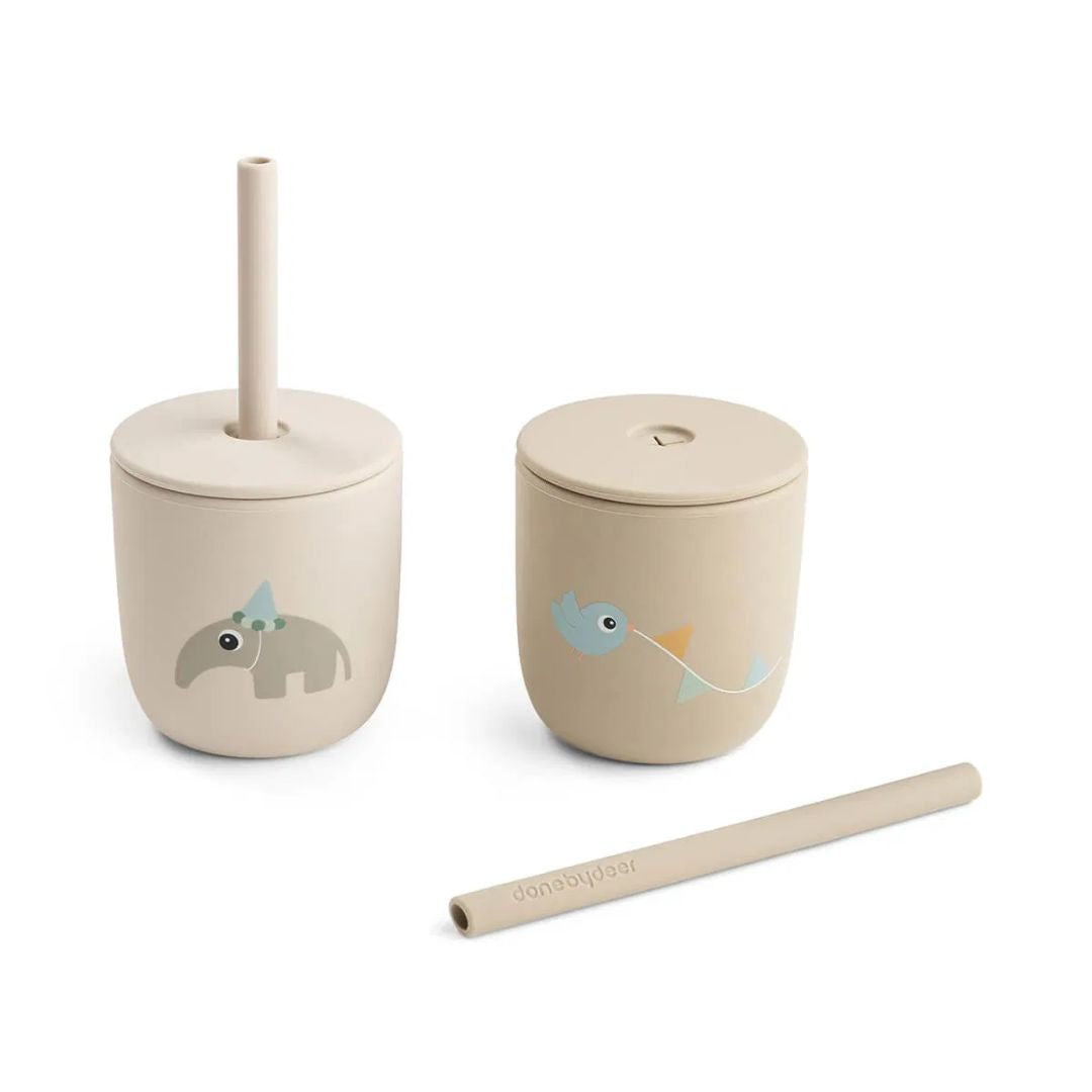 Done by Deer® Silikonski lonček s slamico Celebration Sand 2 kosa Done by Deer