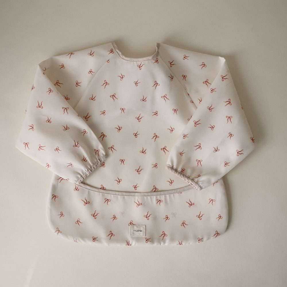 Mushie® Slinček z rokavi Bows Mushie