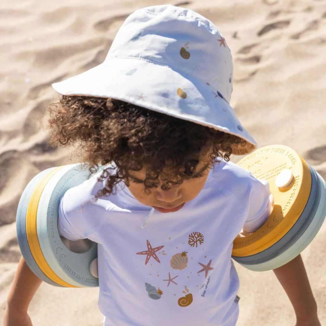 Saro Baby® Obojestranski klobuček z UV zaščito Navy Hugs Saro Baby